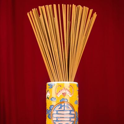 Incense sticks in a ceramic holder